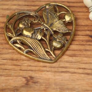 Vintage Butterfly and Floral Embossed Heart-Shaped Brass Brooch